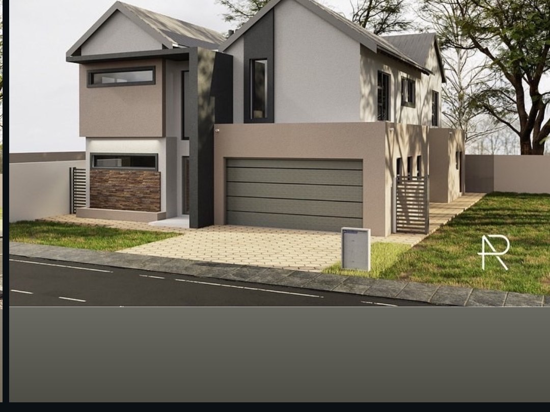 Remodelling — two-storey home with olive garage door